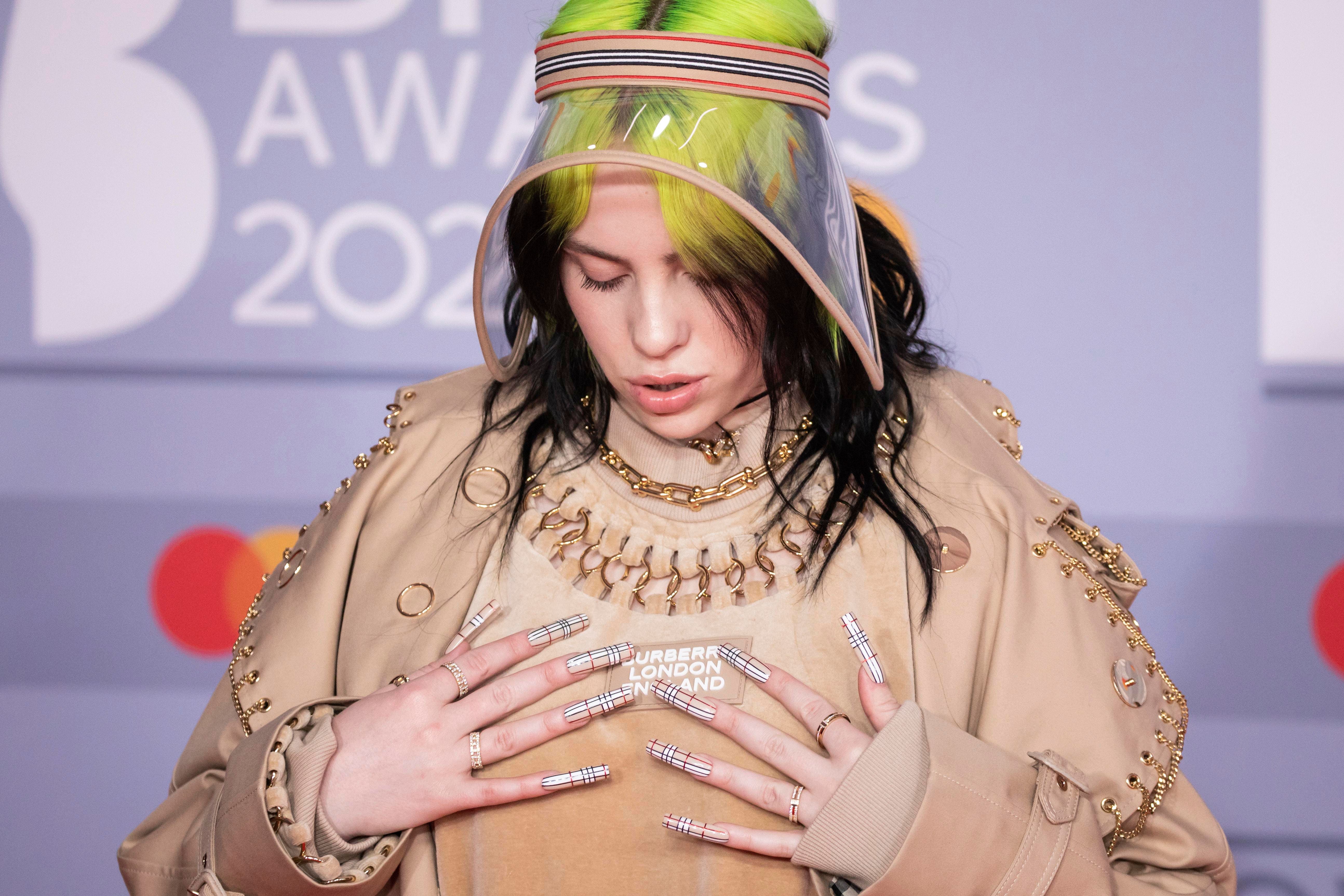 dewi yaya add billie eilish boobs nude photo